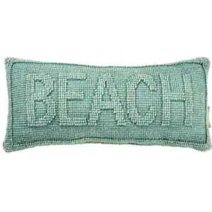 Textured pillow with "BEACH" design