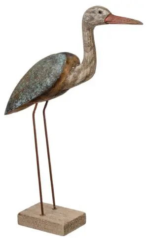Rustic heron statue on stand