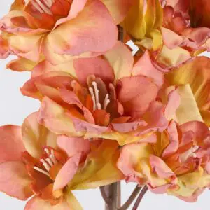 Artificial orange flowers with yellow accents