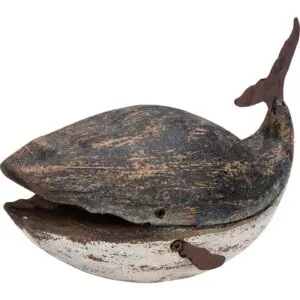 Weathered whale figurine with rustic finish