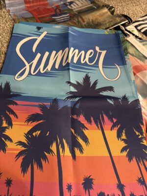 Summer beach towel with palm tree sunset