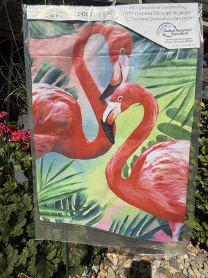 Two pink flamingos on tropical garden flag