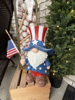 Patriotic gnome statue holding American flag